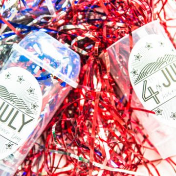 Create a fast and easy Fourth of July craft by using labels, streamers and treat holders.