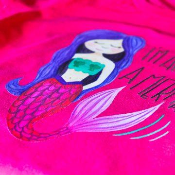 Make this DIY Mermaid shirt using Cricut's new Iron On Designs. Use a household iron or EasyPress to adhere. The easiest way to do Iron On. #Cricut #CricutMade #CricutEasyPress