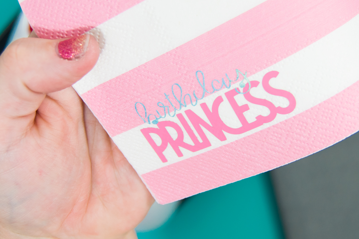 Create your own custom printed napkins at home and at a fraction of the cost. Personalize party napkins to fit any theme. #cricutmade #CricutEasyPress2 #ad #Cricut
