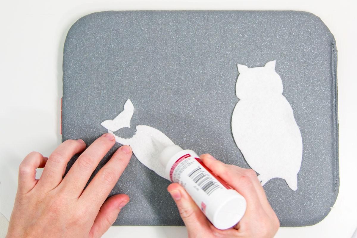 applying fabric glue to felt