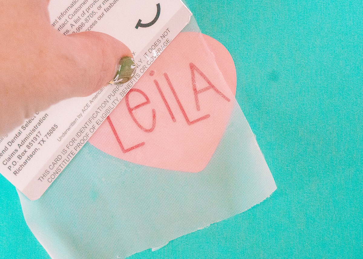 applying glitter vinyl to paper