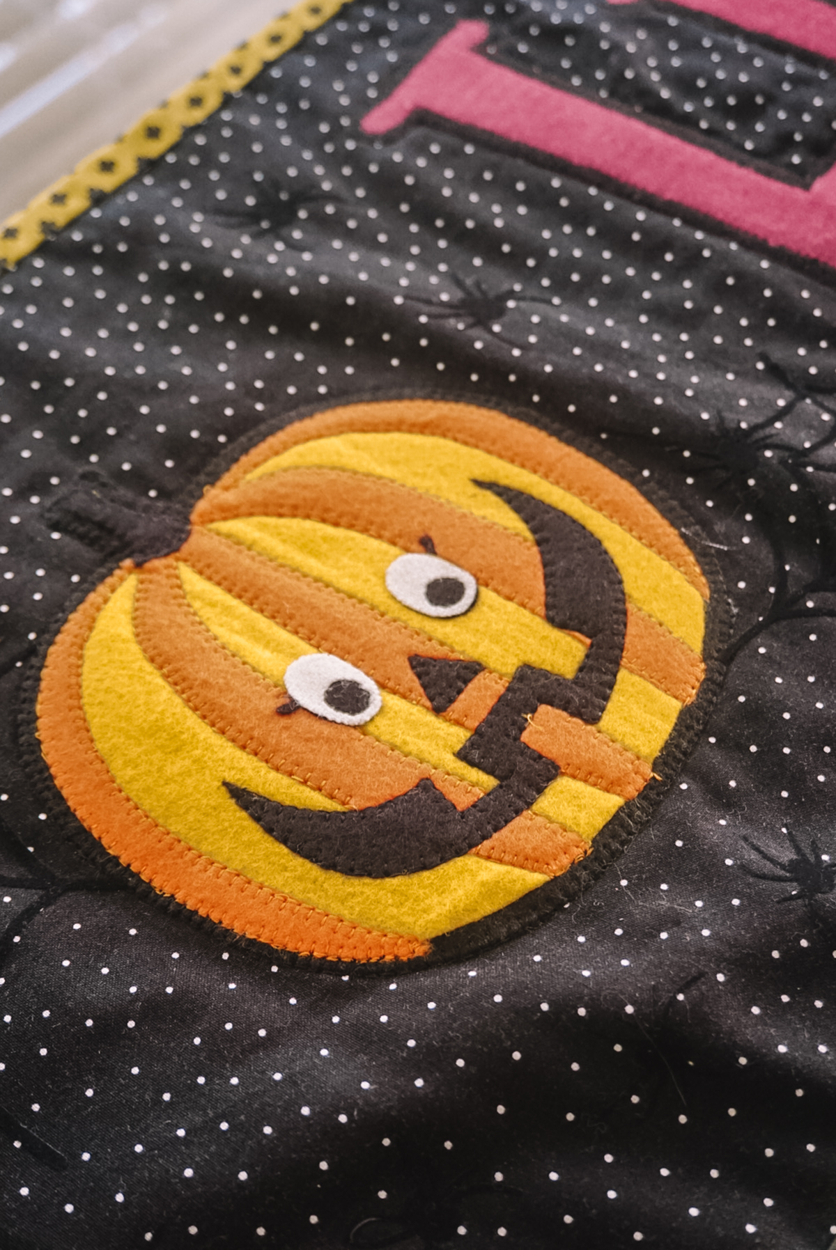 applique pumpkin on table runner