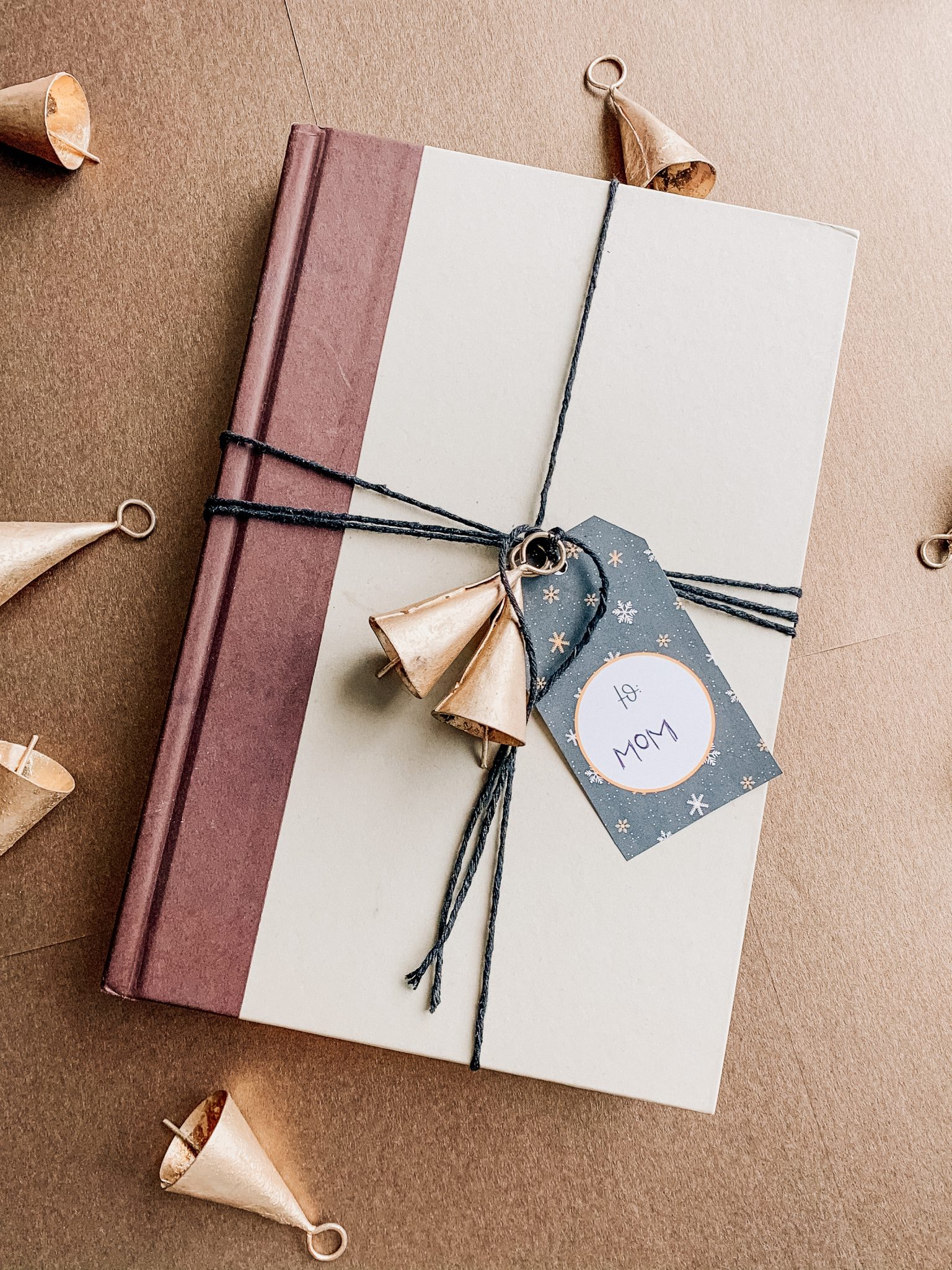 hygge style wrapped book with free printable christmas tags