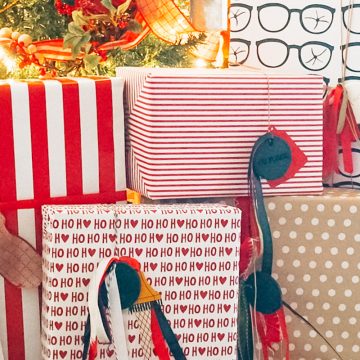 grouping of present wrapped in personalized a christmas story wrapping paper