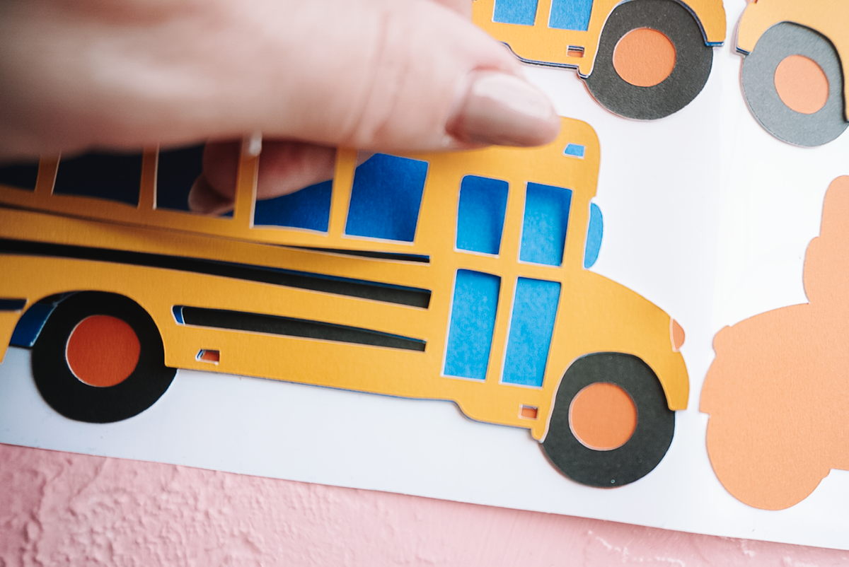 layering adhesive cardstock for diy back to school banner